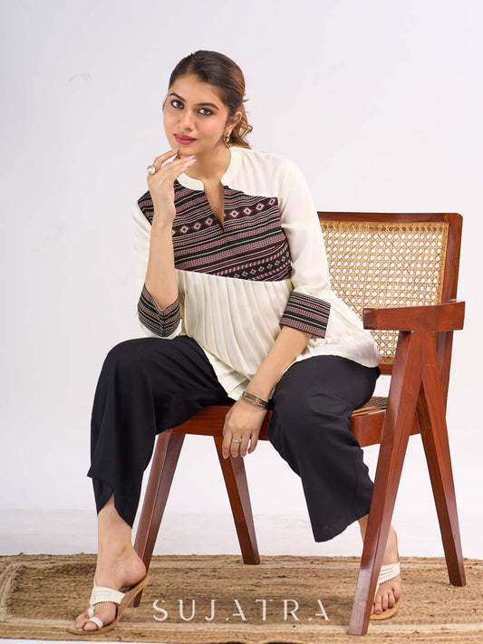 Cream Rayon Designer Top with Contrast Geometric Print Panel & Statement Pleats