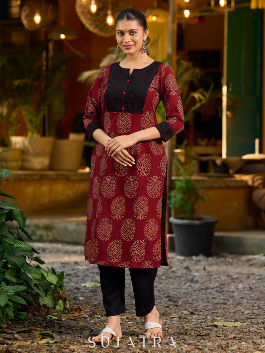 Stunning maroon Ajrakh kurta with an artisanal black pintuck patch.