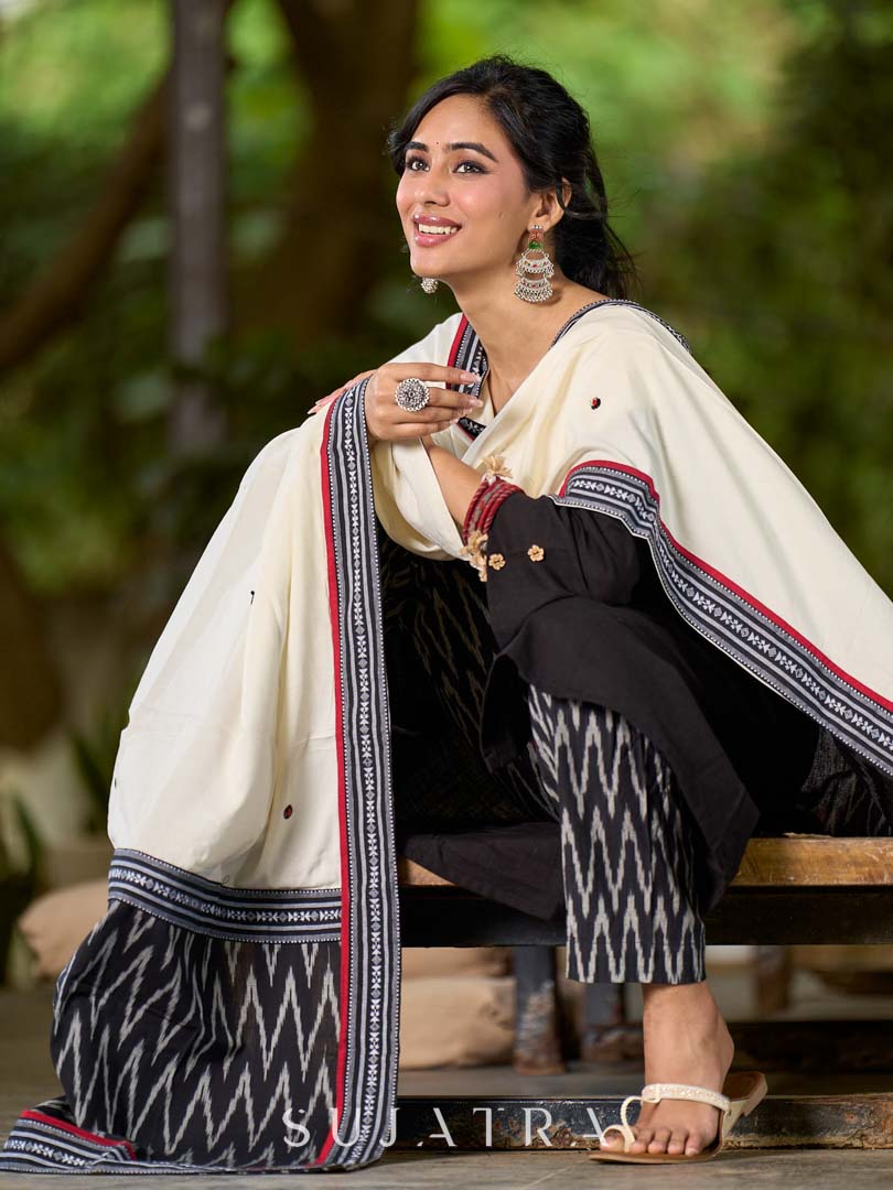 Graceful Off White Rayon Dupatta with Contrasting Ikat Pallu & Minimal Hand Embroidery