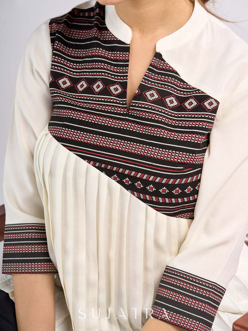 Cream Rayon Designer Top with Contrast Geometric Print Panel & Statement Pleats