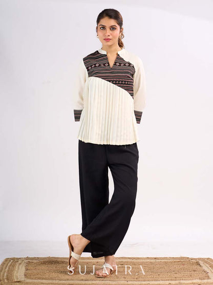 Cream Rayon Designer Top with Contrast Geometric Print Panel & Statement Pleats