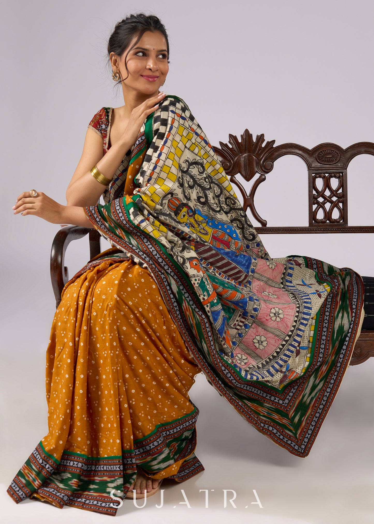 Vibrant yellow Bandhani print rayon saree with hand painted Madhubani art