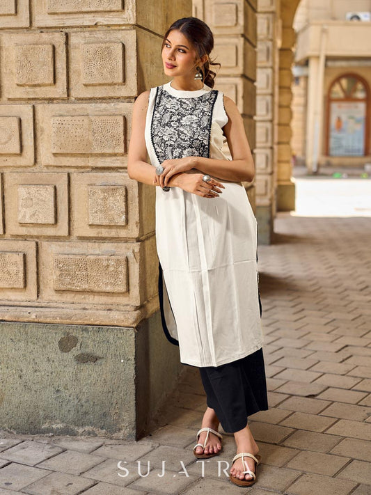 Elegant Off-White Rayon Sleeveless Kurta with Contrast Black Floral Embroidered Yoke Panel