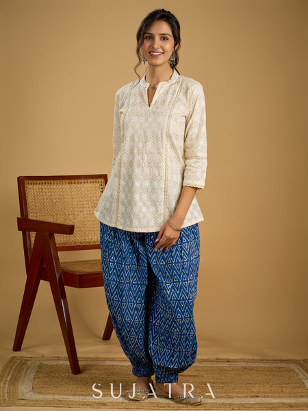 Classic off -white cotton top featuring delicate hakoba embroidery work.