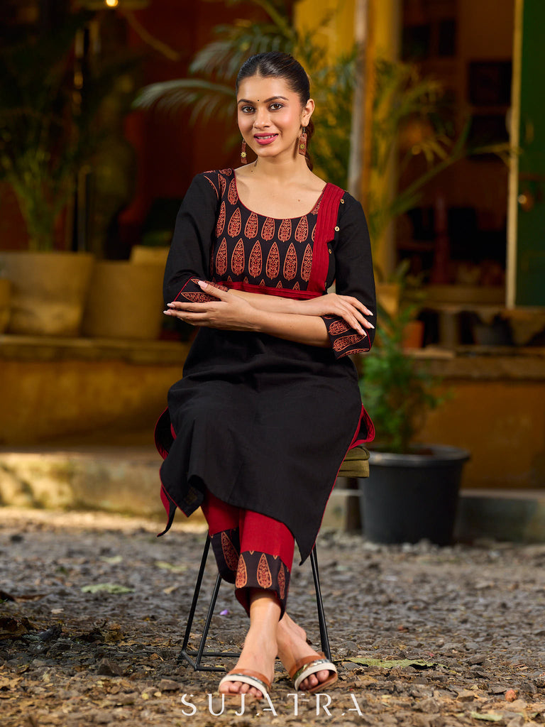 Elegant black kurta featuring an Ajrakh leaf patch across the neck panel