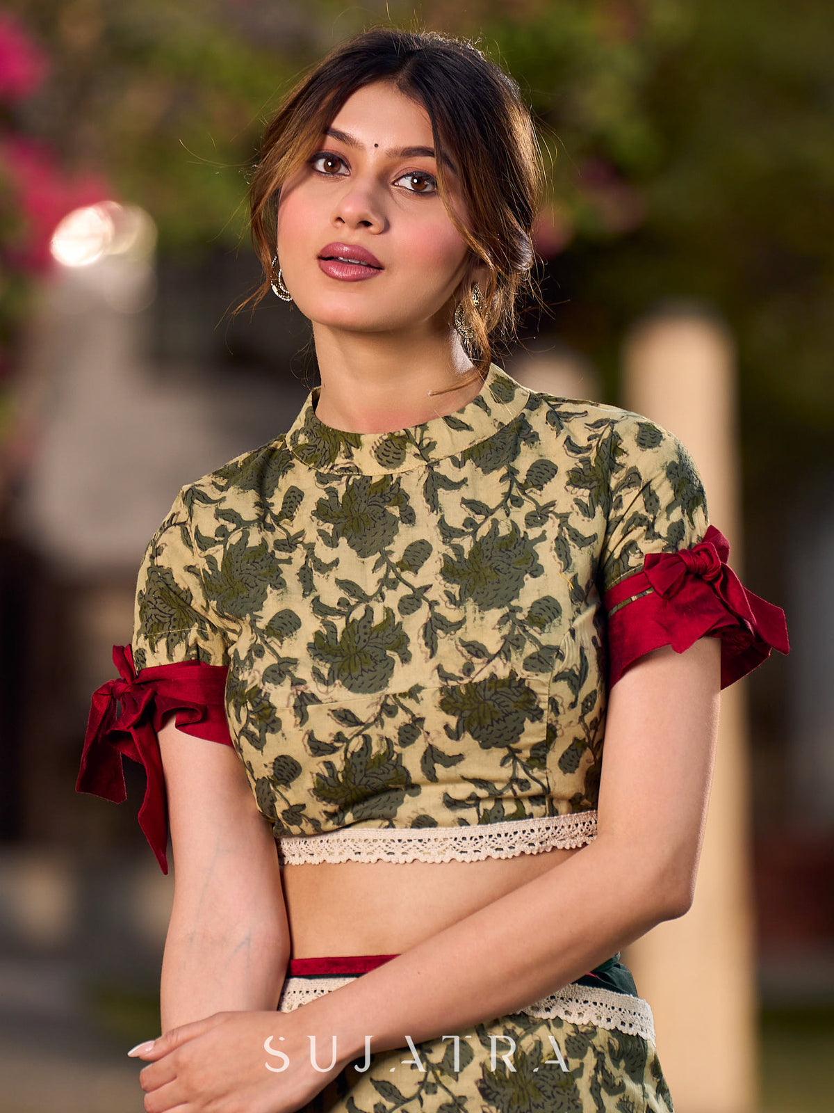 Chic Cream Floral Print Blouse with Statement Red Tie-Up Sleeves