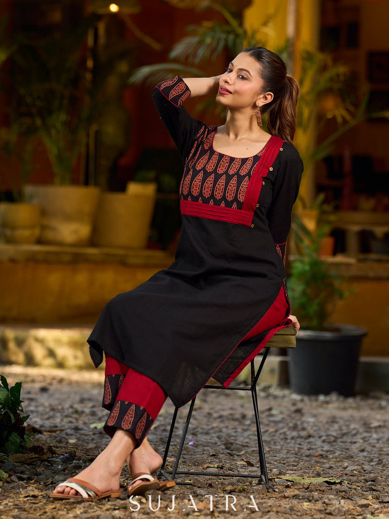 Elegant black kurta featuring an Ajrakh leaf patch across the neck panel