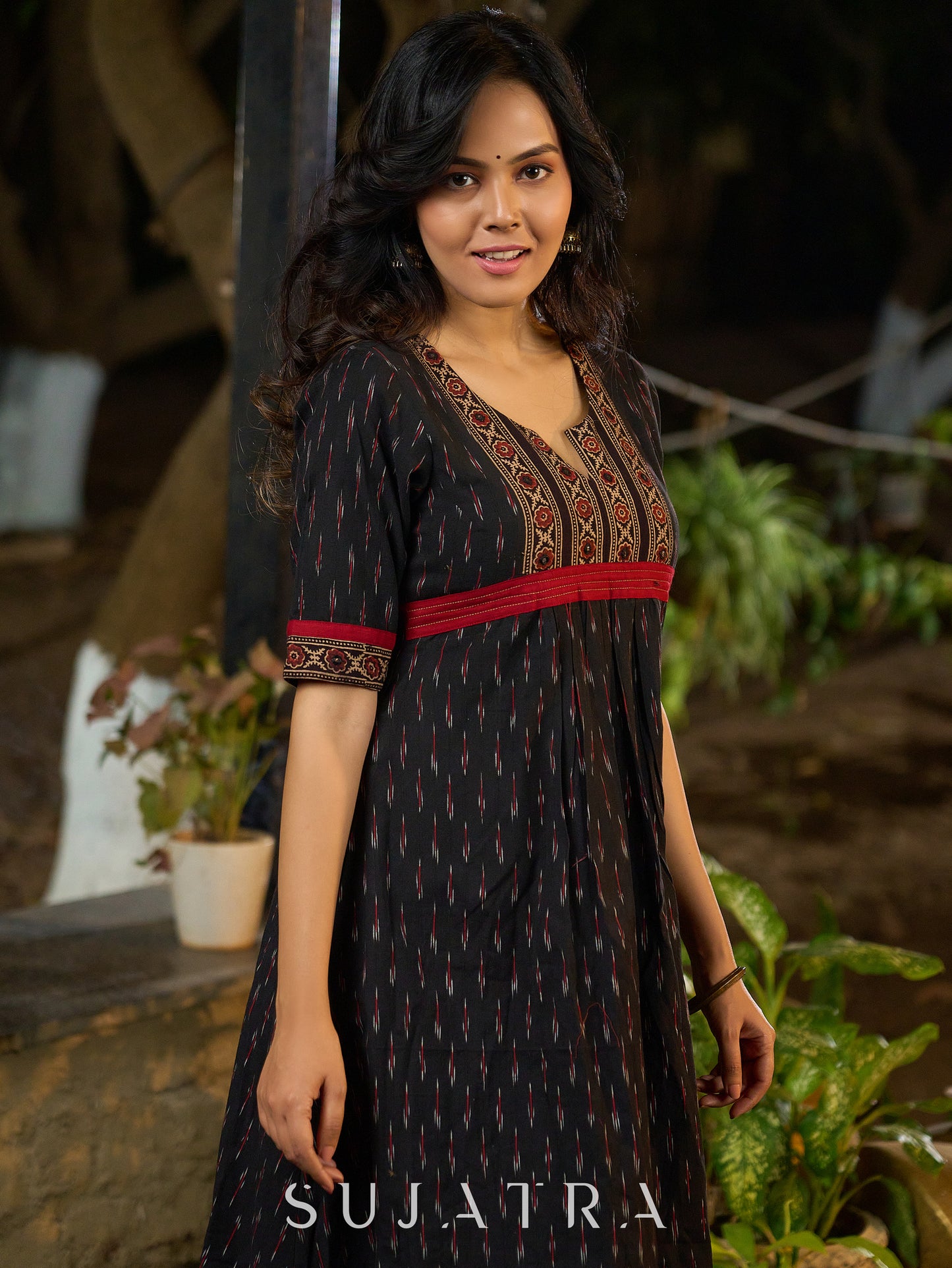 Black Ikat Weave Kurta Featuring Artisan Ajrakh Yoke