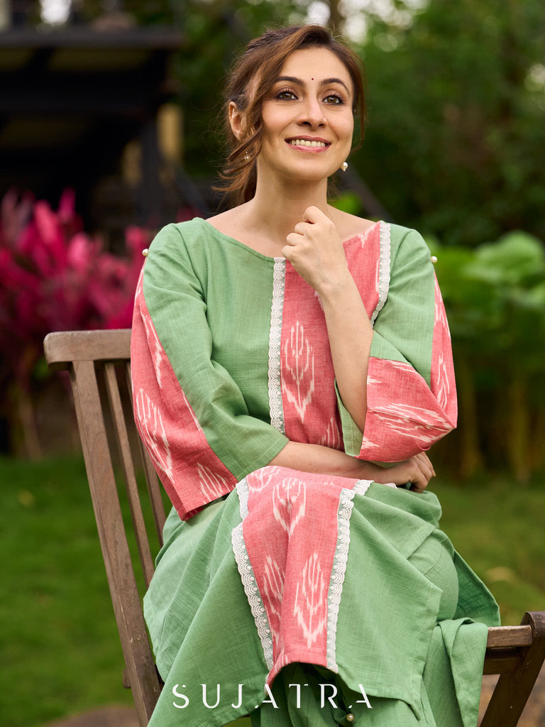 Subtle Pista Cotton Kurta featuring Asymmetric Peach Ikat Border Detailing