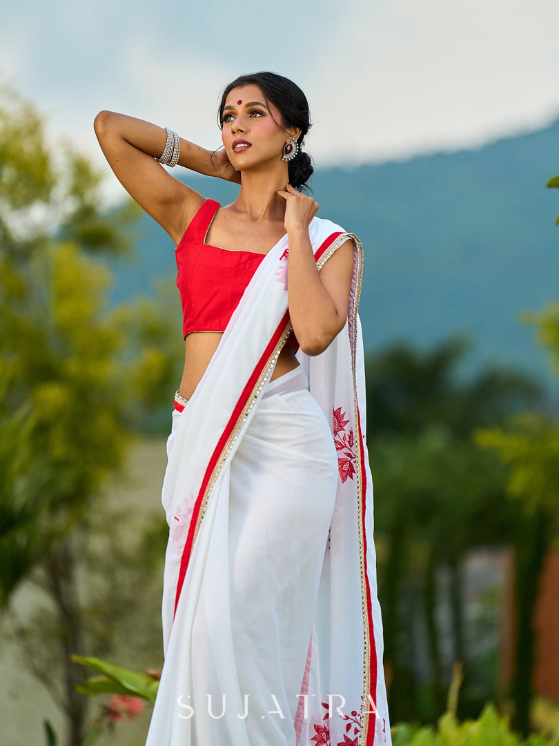 Artisanal White Georgette Saree with Red Embroidered Motifs & Beaded Border Trim