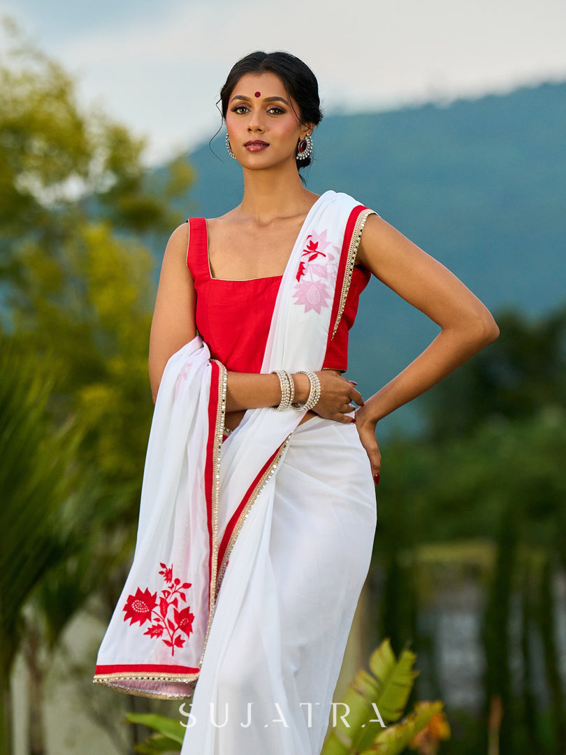 Artisanal White Georgette Saree with Red Embroidered Motifs & Beaded Border Trim