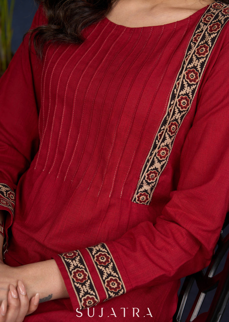 Maroon Cotton Tunic With Stylish Pin Tucks And Vibrant Ajrak Patterns.