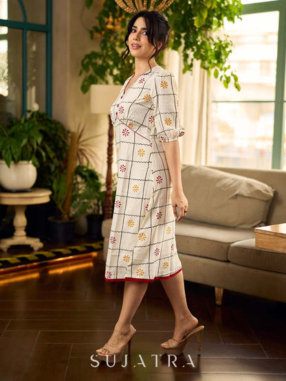 Soft off-white block printed rayon dress with intricate all-over hand block printed checks and florals, a gently gathered yoke, and rich red accents for a refined, elegant everyday look.