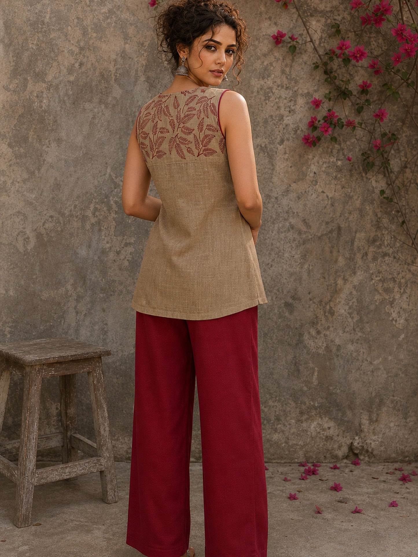 Sophisticated beige waist coat top showcasing refined leaf block print motifs, a polished button-down front, and elegant red piping for artisanal style.