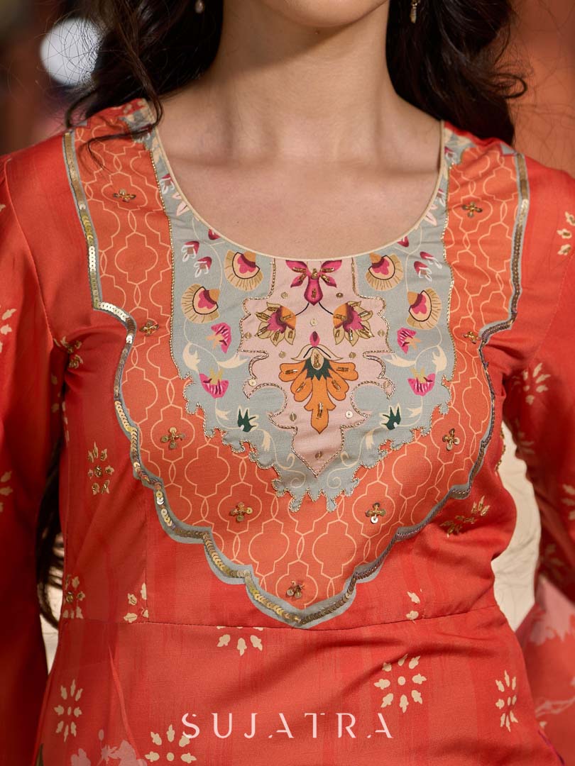 Elegant orange floral printed kurta with hand-embroidered sequin and cut dana detailing on the yoke and rich maroon accents. - Pant Optional