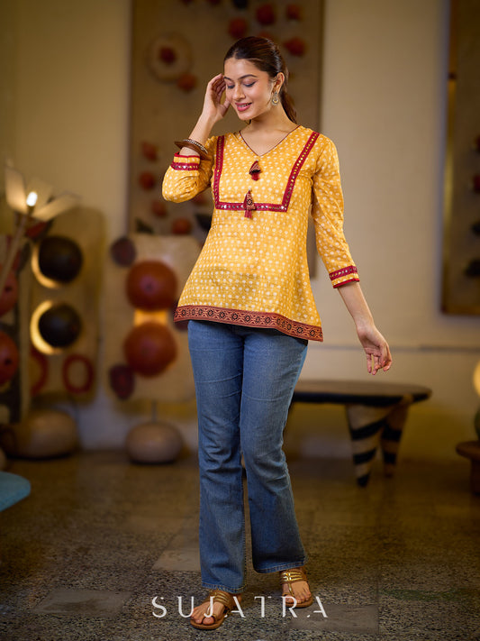 Graceful Yellow Floral Top with Mirror and Tassel Detailing