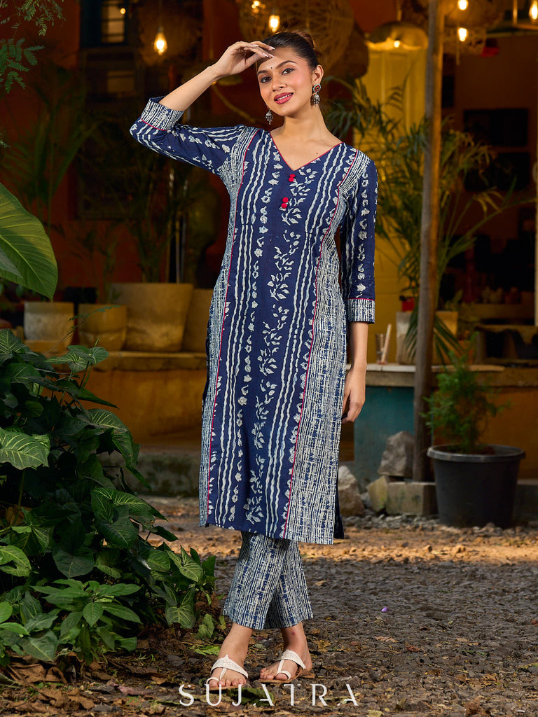 Indigo kurta elevated with delicate pink piping and buttons
