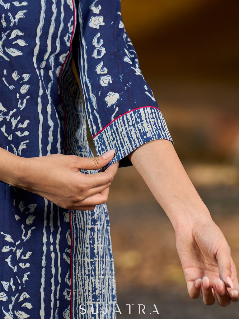 Indigo kurta elevated with delicate pink piping and buttons