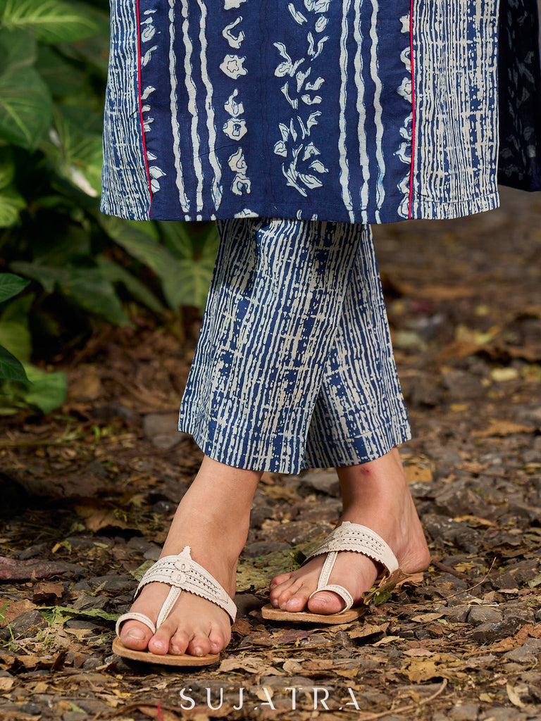 Indigo kurta elevated with delicate pink piping and buttons
