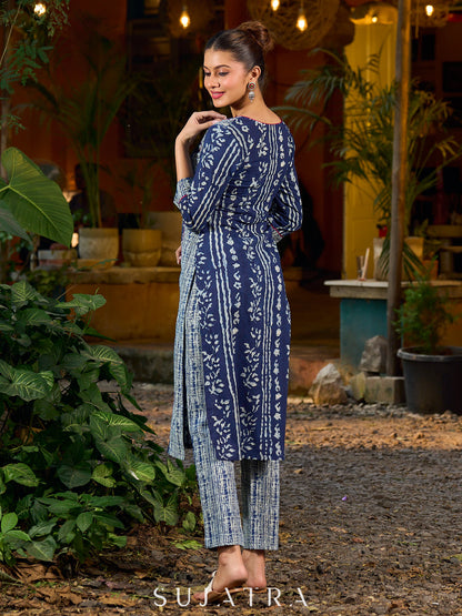 Indigo kurta elevated with delicate pink piping and buttons