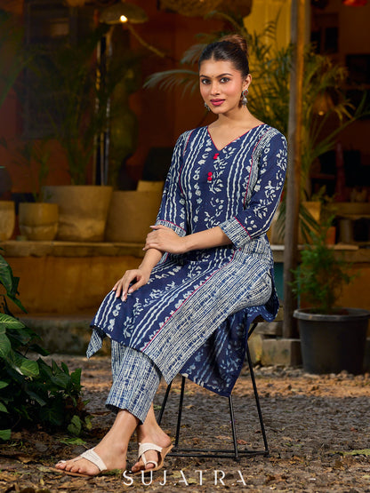 Indigo kurta elevated with delicate pink piping and buttons