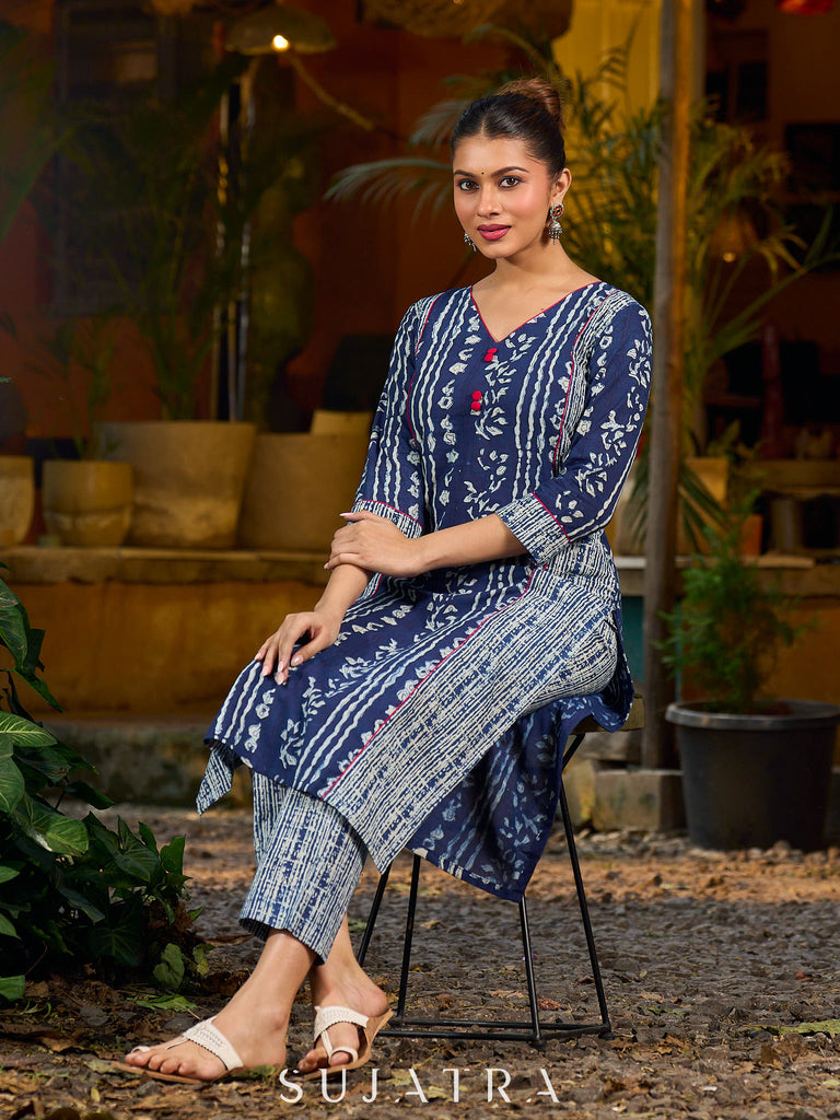 Indigo kurta elevated with delicate pink piping and buttons