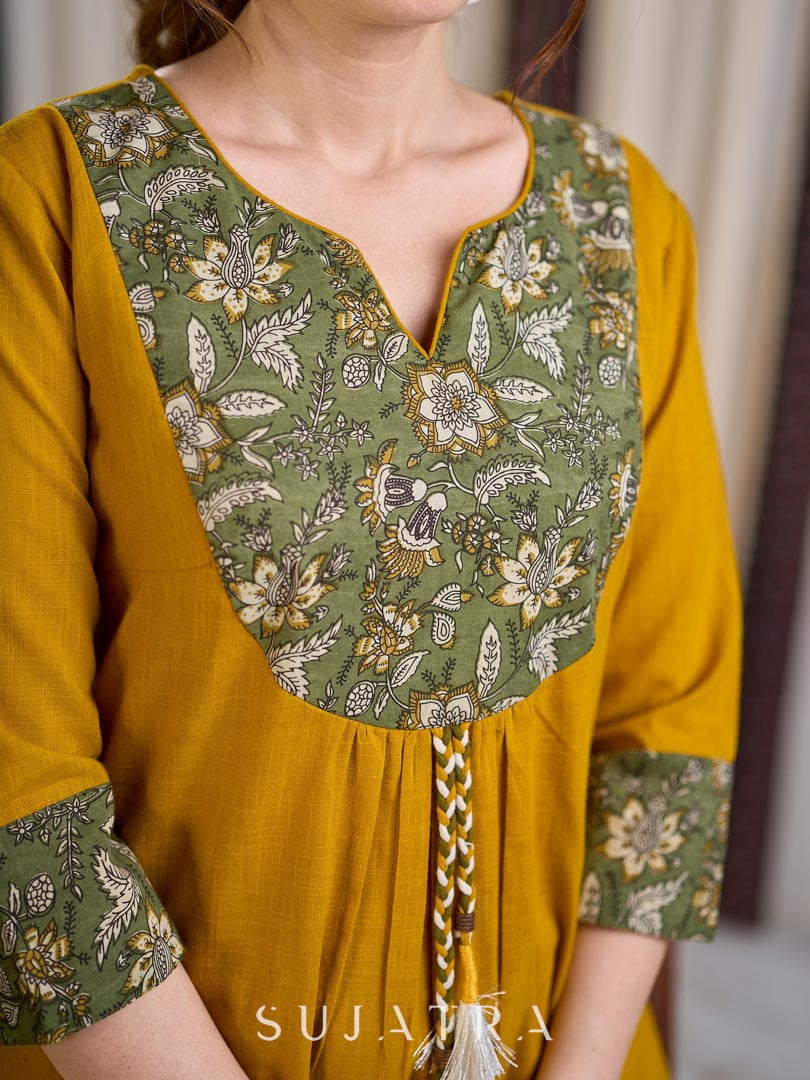 Vibrant Mustard Cotton Kurta with Olive Floral Print Yoke and Statement Tassel Embellishment - Pant Optional
