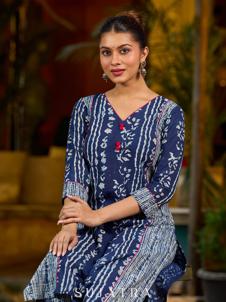 Indigo kurta elevated with delicate pink piping and buttons