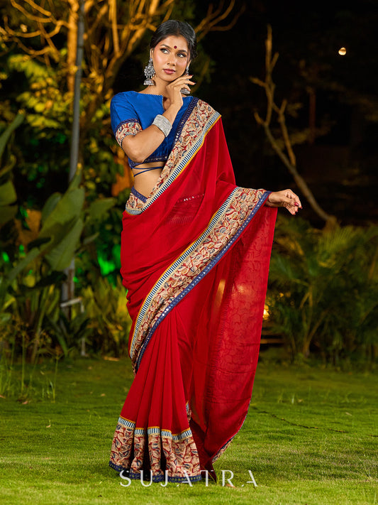 Poised Red Georgette Saree with Kalamkari & Indigo Border Highlighted with Mirror Lace Trim