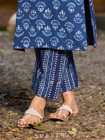 Timeless indigo kurta with an indigo border yoke and delicate stripe piping.