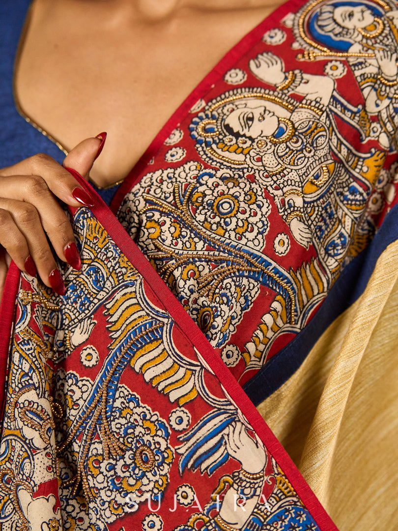 Folk-Inspired Golden Assam Silk Saree with Kalamkari Embroidered Border & Trim