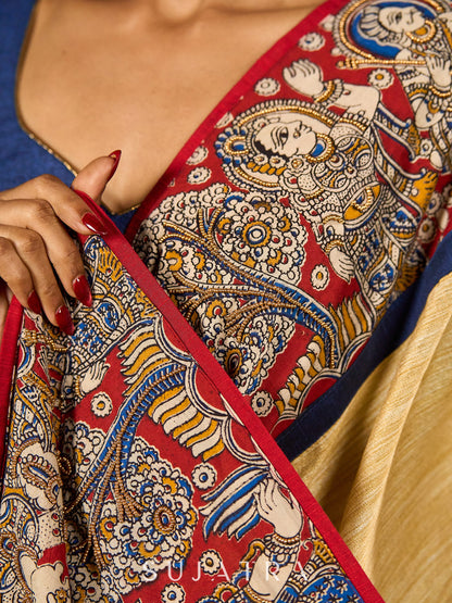 Folk-Inspired Golden Assam Silk Saree with Kalamkari Embroidered Border & Trim