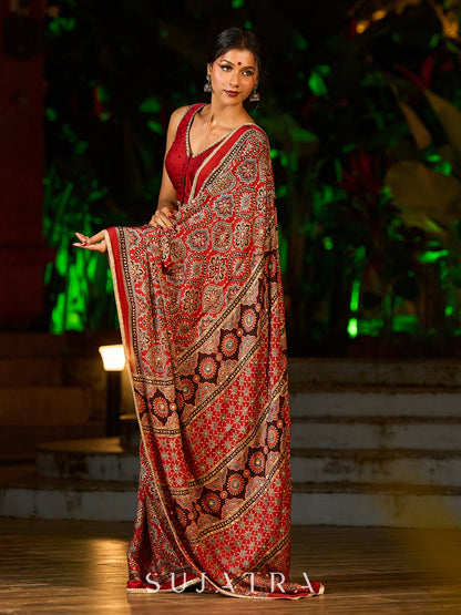 Striking Maroon Modal Silk Saree with Traditional Ajrakh Print & Contrast Gold Lace Detail & Hand Embroidered Pallu