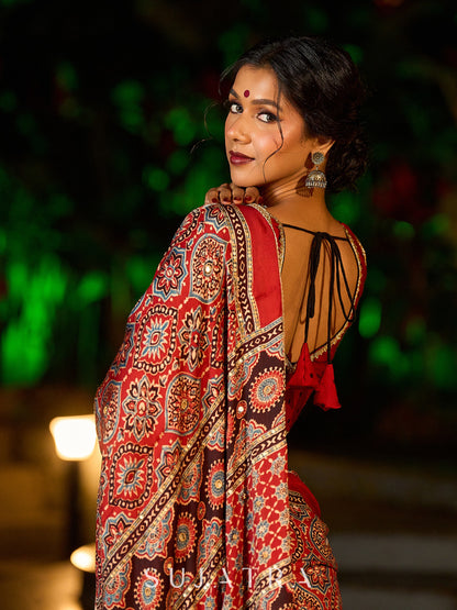 Striking Maroon Modal Silk Saree with Traditional Ajrakh Print & Contrast Gold Lace Detail & Hand Embroidered Pallu