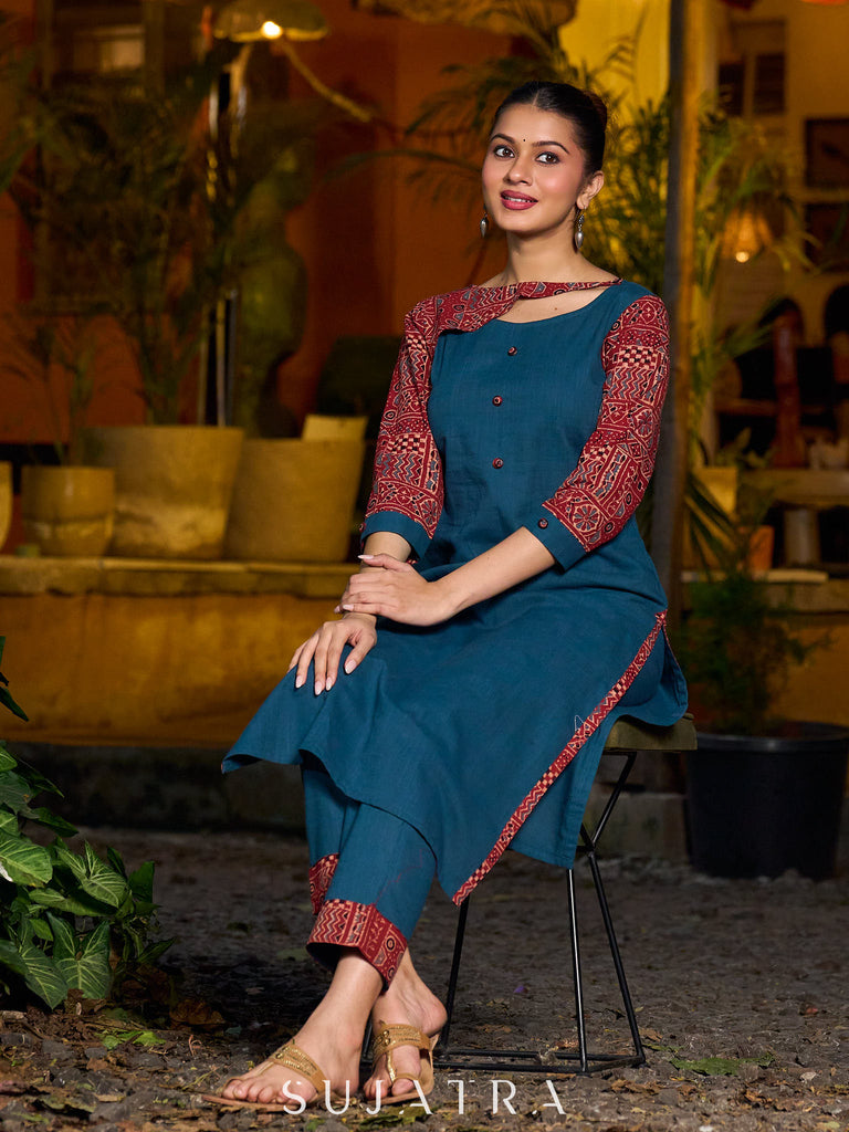 Teal kurta with contrasting Ajrakh sleeves and a chic neck cut