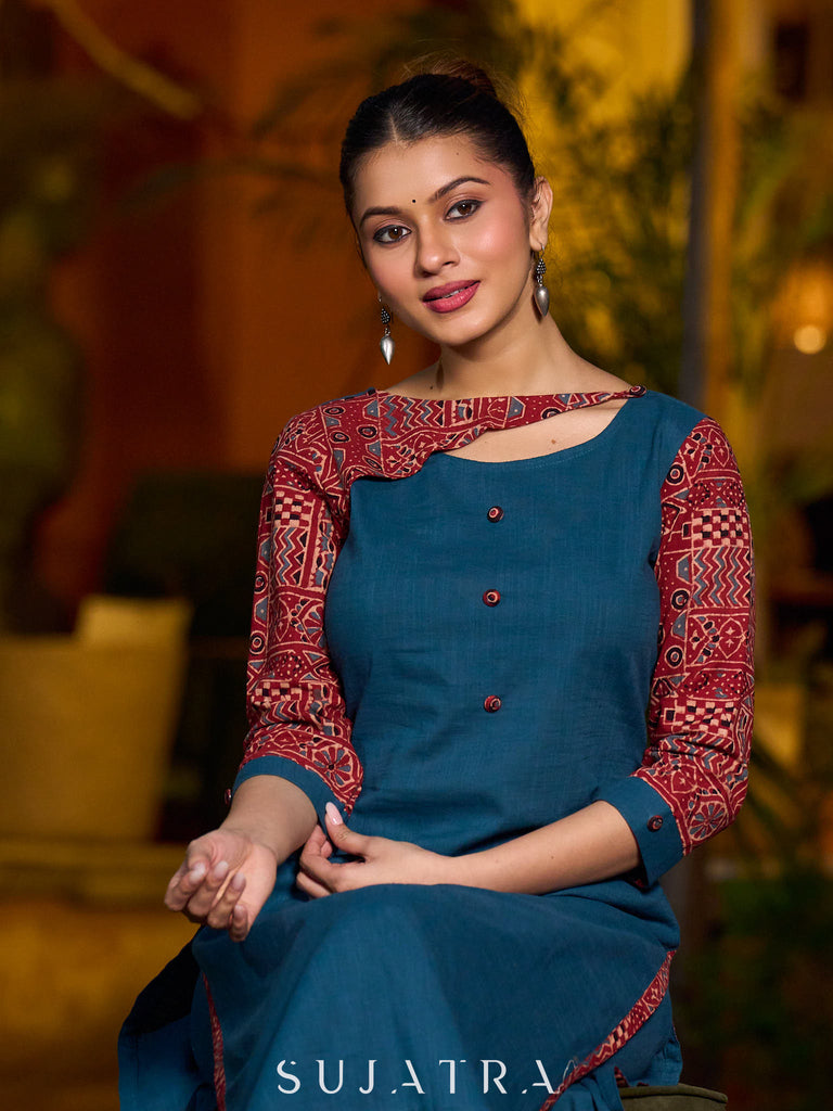 Teal kurta with contrasting Ajrakh sleeves and a chic neck cut