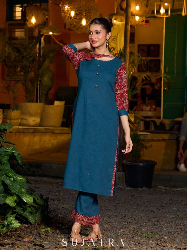 Teal kurta with contrasting Ajrakh sleeves and a chic neck cut