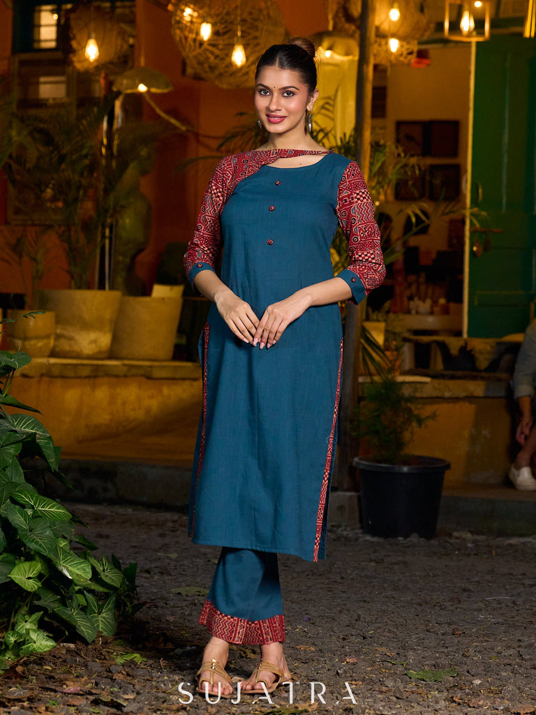 Teal kurta with contrasting Ajrakh sleeves and a chic neck cut