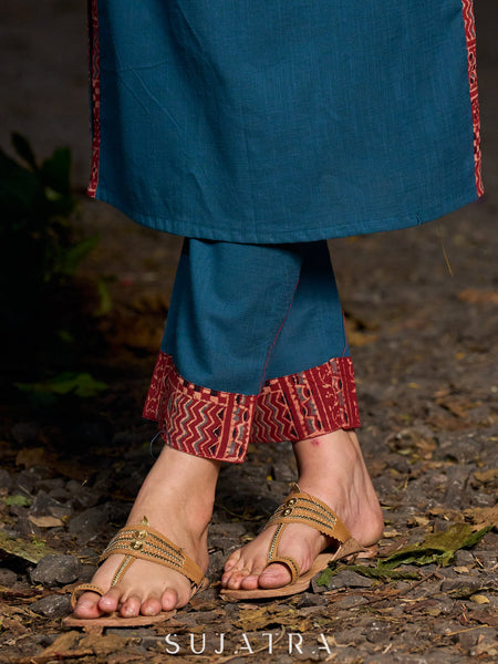 Chic teal pants featuring a bold Ajrakh contrast border.