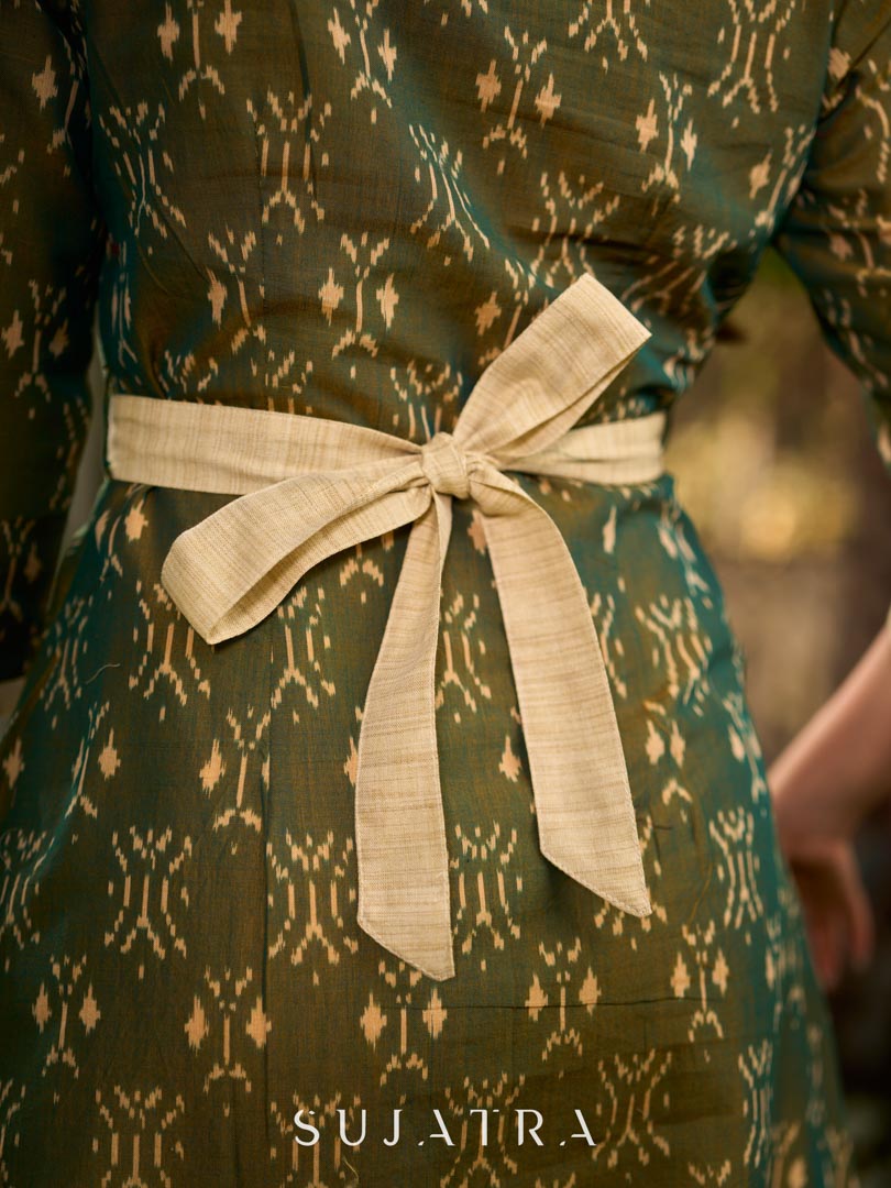 Statement olive green two-tone Ikat dress elevated with cream and gold accents, a structured belt for definition, and a subtle left-front slit.