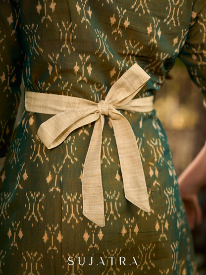 Statement olive green two-tone Ikat dress elevated with cream and gold accents, a structured belt for definition, and a subtle left-front slit.