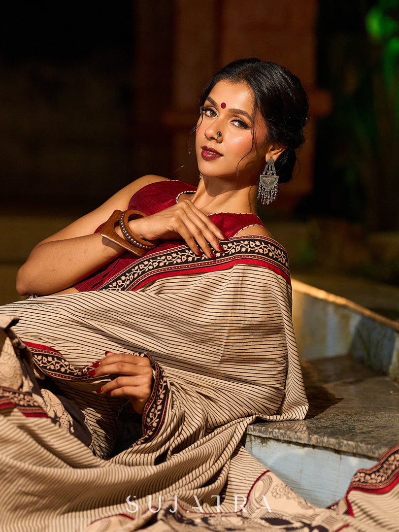 Striking Beige Kalamkari Print Saree with Striped Border & Mythological Motifs and Ajrakh Border Trim