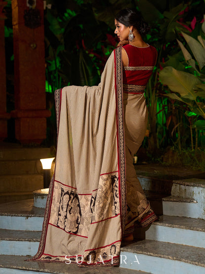 Striking Beige Kalamkari Print Saree with Striped Border & Mythological Motifs and Ajrakh Border Trim