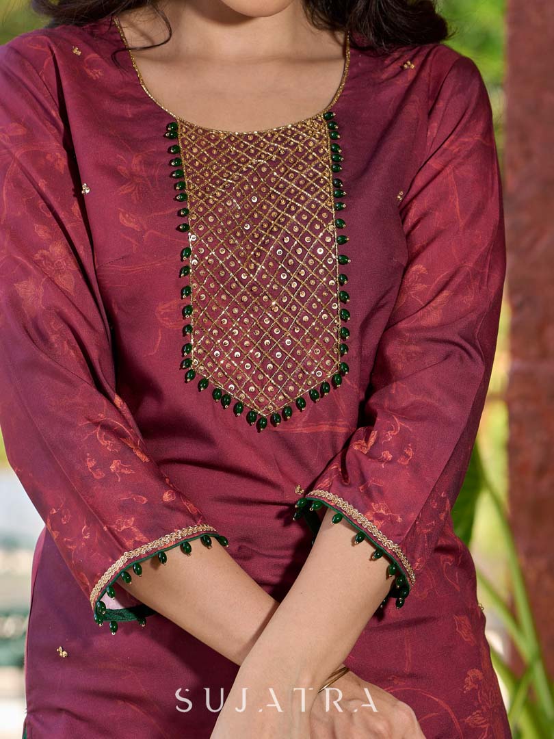 Exquisite deep burgundy printed kurta with intricate neck panel embroidery, delicate green beads, and refined green highlights. - Pant Optional