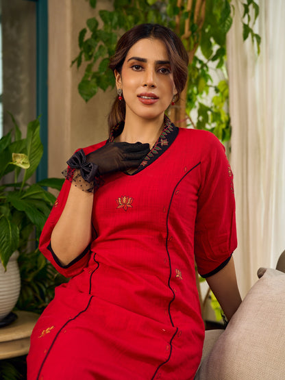 Elegant red dress featuring delicate, hand-painted Madhubani lotus motif detailing.