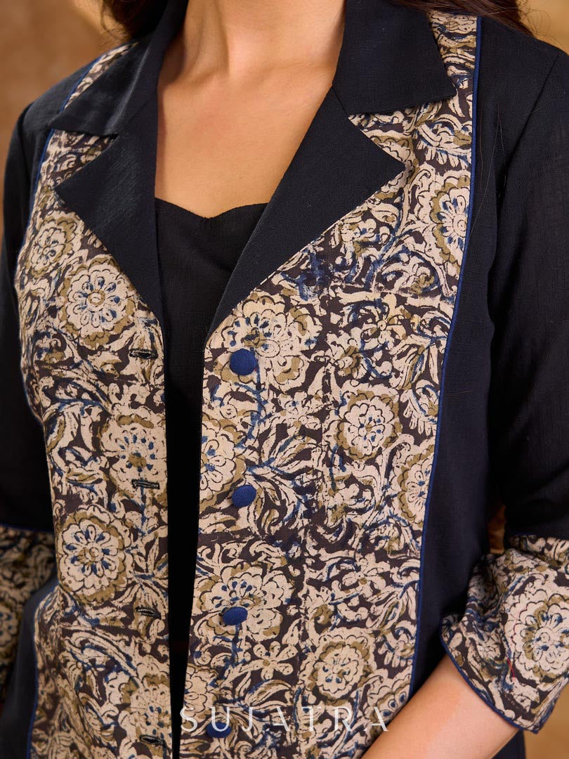 Elegant black and navy Kalamkari jacket featuring a notch collar and subtle navy accents, creating a graceful, tailored silhouette suited for polished corporate wear.