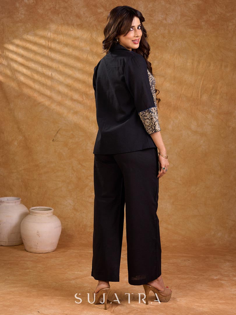 Elegant black and navy Kalamkari jacket featuring a notch collar and subtle navy accents, creating a graceful, tailored silhouette suited for polished corporate wear.