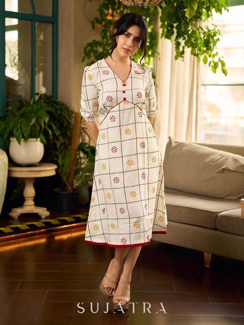 Soft off-white block printed rayon dress with intricate all-over hand block printed checks and florals, a gently gathered yoke, and rich red accents for a refined, elegant everyday look.