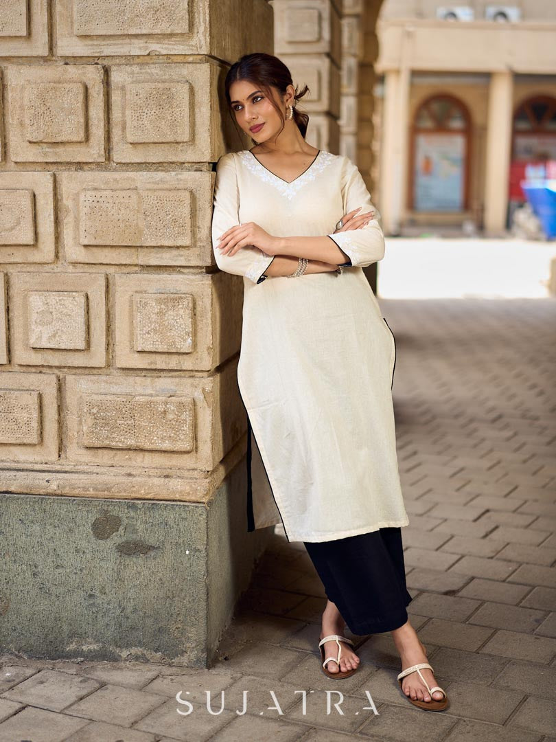 Pristine Off-White Cotton Flex Straight Kurta Featuring Subtle Monochrome Embroidery on Neckline & Sleeve Cuffs