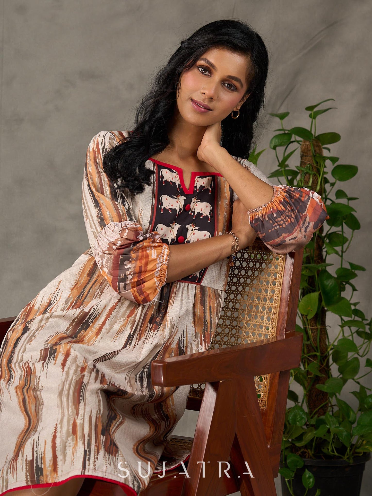 Heritage Pichwai inspired abstract cow motifs dress with red details